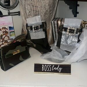 Fabric camouflage, pointed toe zip up bootie with rhinestone buckle detail